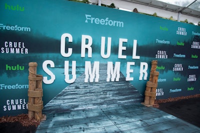 To celebrate season 2 of teen anthology series Cruel Summer, Freeform transformed a park in Los Angeles into the show’s lakeside setting of Chatham, Wash. The red carpet, which had water- and dock-inspired elements, quickly set the tone for the May 31 gathering. “We knew right away that this screening also had to happen from across a body of water, and that was a prerequisite for finding the right location and designing everything around it,” explained Freeform's Theresa Travis.