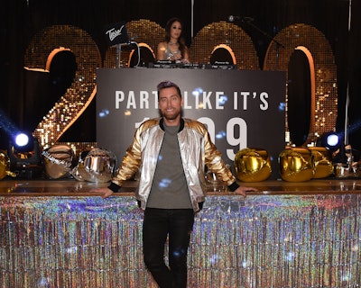 To further incorporate the theme, celebrities who were well known from the era—including NSYNC’s Lance Bass (pictured), along with Matthew Lawrence, Tori Spelling, Mario Lopez, Tara Reid, and Beverley Mitchell—were invited to the event. “We always try to be as authentic to the series as we can be, and it felt so right to invite celebrities that were really having a moment during 1999,” said Travis.