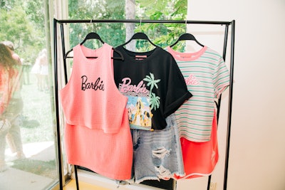 The Barbie x Forever 21 collection includes fun graphic tees and Barbie-branded tanks.