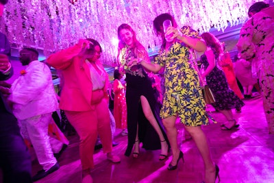 Floral strands hung from the ceiling above the dance floor.