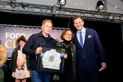 Former and current FOOD & WINE editors in chief Dana Cowin and Hunter Lewis surprised Bobby Flay with his 1992 past-due Best New Chefs award. Flay never received the original due to a change in programming at the Classic 31 years ago.