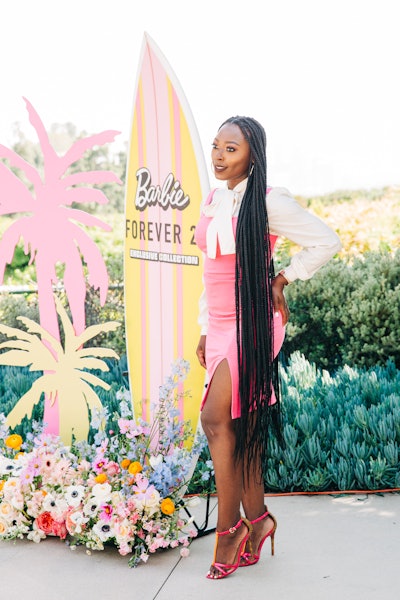 Surf's up—attendees could pose next to a Barbie-branded surf board.