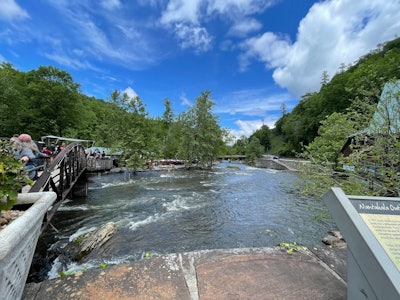 The Great Smoky Mountains Railroad lets passengers off for an hour at the Nantahala Outdoor Center, where they can shop, grab a drink, and watch white-water rafters go by.