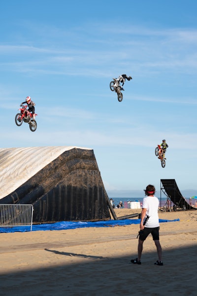 Athletes performed high-level tricks during freestyle motocross events.