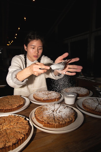 Chef de partie Christine Kuo of Gucci Osteria da Massimo Bottura in Beverly Hills presented a gala apple tart with streusel topping for dessert.