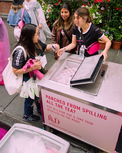 Visitors received a KVD Beauty-branded tote bag, a KVD Queen of Poison Everlasting Hyperlight liquid lipstick, and a sweet pink treat from Chloe’s Pops. A thousand people visited the 16-foot mobile showroom and activation.