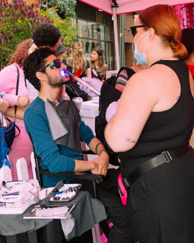 At this consumer-facing event, visitors were able to participate in on-site activities, including lipstick try-ons, tooth gem applications, and posing in a retro four-print photo booth. KVD Beauty also partnered with Sephora and nonprofit Pact Collective to collect attendees’ empty lipstick containers, which were traded in for a new lipstick.