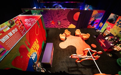 The Nickelodeon lounge included an interactive splat wall where creators could activate a hidden prize, plus a merch station with custom branded Members Only jackets, a free-standing splat photo moment, and a coffee bar featuring Nickelodeon-branded latte art compliments of Instagram star @baristart.