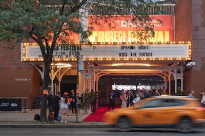 New York City-based urban design firm Urban Umbrella supplied the festival’s canopy for the red-carpeted entrance at BMCC Tribeca Performing Arts Center. The custom-designed canopy featured sprawling white arches, a 20-foot opening that extended over the entrance, ornamental lighting, and a classically inspired illuminated cinema marquee.