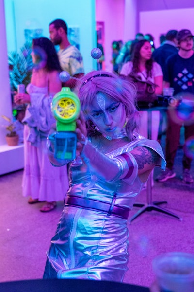 Aliens and otherworldly creatures mingled with guests on the dance floor.