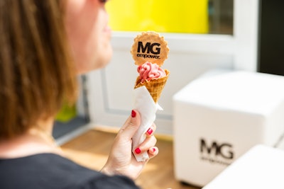 On site, the team offered branded goodies like desserts and bright-yellow sunglasses. DesignScene was the production partner for the activation.