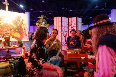 A refuge from the day, attendees took off their shoes to enter the 'Deep Space' tea lounge to enjoy relaxation, connection, and (of course) tea service.