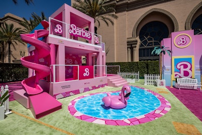 The pink slide and pool were some of Deeds' favorite touchpoints. Her takeaway for other planners: 'Embrace the nuances and details, so that the guests and fans take away a memory by enjoying an experience that translates something that is nostalgic, such as Barbie, to an environment that is tactile and filled with life and eye candy.'