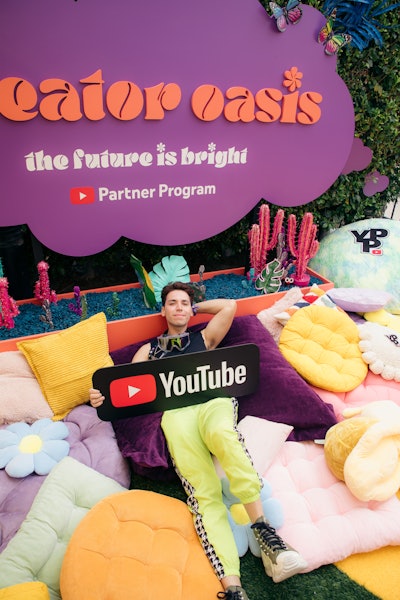 Another fun spot? A pillow-filled 'creator oasis' with a lounge mascot and photo opportunities.