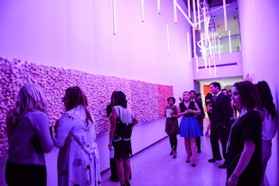 In 2017, Toronto’s Power Plant Contemporary Art Gallery hosted Power Ball XIX: Stereo Vision, which was designed by Candice&Alison. At the benefit, guests nibbled from a wall of edible marshmallows by Archimallows. More than 8,000 treats were individually attached to the wall using skewers; the gradient-colored marshmallows tasted like peach.
