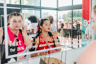 At About-Face’s activation, festivalgoers could get festival-ready beauty looks using the brand’s products. Mirrors advertised a text code that guests could use to get 25% off a makeup order.