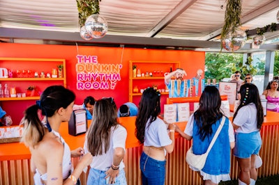 Guests who downloaded the Dunkin’ Awards app before the festival were treated to perks on site. They were granted access to the activation’s rooftop lounge, where they could sample free treats including butter pecan iced coffee and blueberry cake Munchkins.