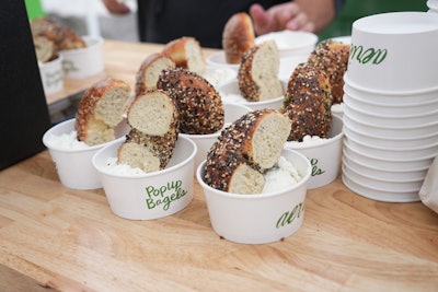 Popup Bagels distributed bagels with cream cheese and butter schmears.