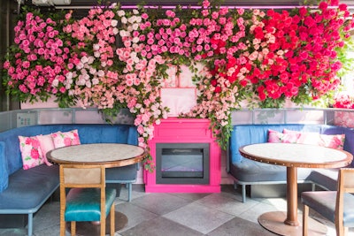 The ombré theme continued throughout the Moxy rooftop space, with varying shades of pink roses blending into each other.