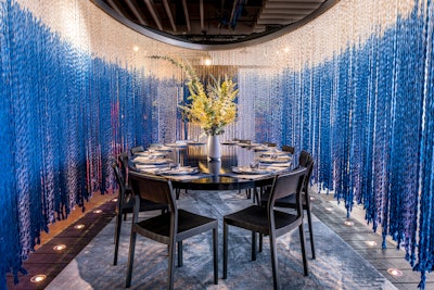 At DIFFA’s annual Dining by Design fundraising event, Rockwell Group—in partnership with The Rug Company—created an elliptical curtain made of 400 strands of hand-dyed, blue ombré carpet fibers. The space showcased the Lola rug, designed by David Rockwell and his daughter, Lola.