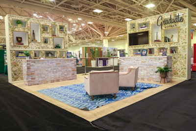 One of our favorite respites from the busy show floor was Graduate Hotels' lobby-inspired lounge. Standout touches included desks made out of books, floral wallpaper, and details that paid homage to some of the college towns where you can find the hotel brand.