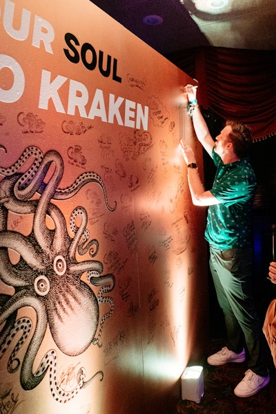 From there, guests were also able to sign a graffiti wall before choosing one of three bars for a Kraken Rum libation.