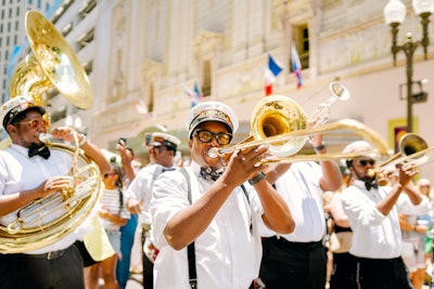 During Engage!22 New Orleans, attendees joined a second line procession down Bourbon Street.
