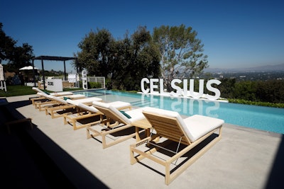 Upon entering Dobrik's abode, guests were greeted with a branded CELSIUS pool photo op and a bar area to pick out their favorite branded merch.