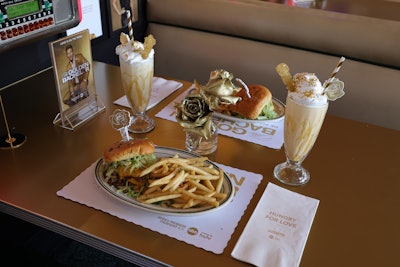 In addition to the special milkshakes, Mel's Drive-In offered buy one, get one free date-night meals throughout the weekend. Tables were adorned with custom place mats and napkins, plus—what else?—gold-dipped roses.
