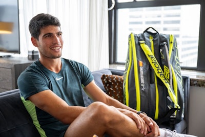 BMF’s team outfitted the room in a branded step-and-repeat and an oversize Babolat tennis racquet—the perfect setting to honor the contract signing. Meanwhile, Alcaraz, of course, attended with his tennis bag from the French brand in tow.