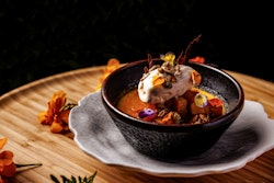 Lona by Chef Richard Sandoval, a modern Mexican eatery in Tampa, is serving the Caramelized Pumpkin Crema this season. The eye-catching dish is made with pumpkin custard, caramelized pepitas, edible marigolds, and cinnamon ice cream.