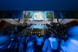 The idea of flowing water was used as a design element this year to tell a connected visual story. 'This design started on Howard Street with trust falls, flowing into the lobby of South Moscone Center and down the escalators, pooling at the entrance to Campground, the first stop of learning on the journey, and then extended throughout the long pathway leading to Lodge Village, where attendees could dive deep into their area of expertise,' said Katherine Pettit, executive creative director for George P. Johnson, the experiential firm behind Dreamforce.