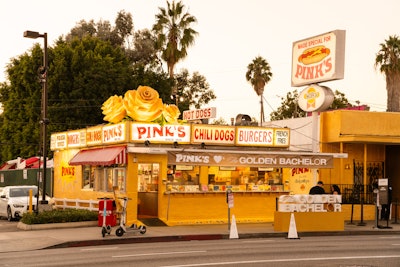 LA's Pink's Hot Dogs has also been temporarily painted gold; the space is offering limited-edition hot dogs (two dogs in one bun!) as well as specials from 5-7 p.m. daily.