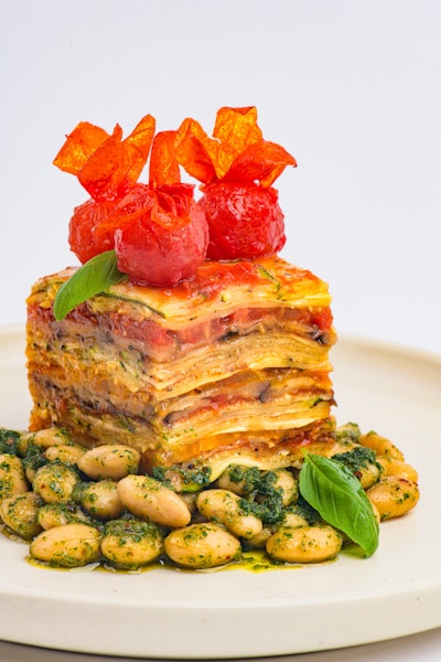 National catering company Wolfgang Puck Catering is currently serving the Grilled “Ratatouille” Terrine, made with fall flavors like butter beans, salsa verde, aged balsamic, and petite basil.