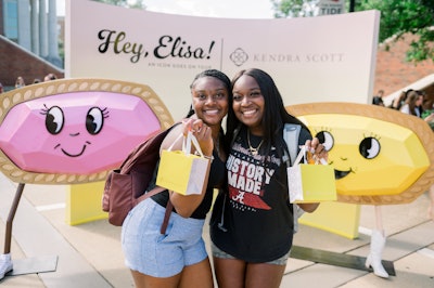 The mobile tour also features colorful photo ops, including one with life-size Elisa-shaped characters. During the experience, students can receive complimentary necklaces and branded swag that’s been customized for each stop’s city and school colors.