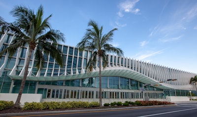 The Miami Beach Convention Center spans 1.4 million square feet spread across 491,000 square feet of contiguous exhibit space, a 60,900-square-foot grand ballroom, four junior ballrooms, and 84 meeting rooms.
