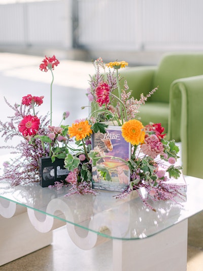 VHS tapes were incorporated into some of the floral arrangements, provided by Duet Botanical.
