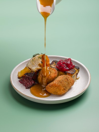 As part of its new fall/winter menu, Toronto's Eatertainment is offering a food station the team describes as 'Thanksgiving dinner in a mini meal.' The dish features roasted turkey and mashed potato croquettes with cranberry chutney, sourdough stuffing, and roasted root vegetables in thyme butter.