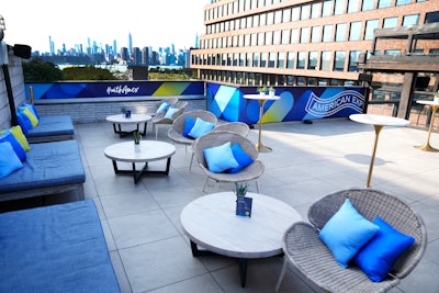 When not showing off their serve, guests could relax on an alfresco patio overlooking the Manhattan skyline that was decked out in Amex Blue, of course.