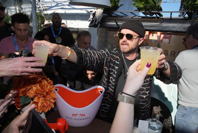 Aaron Paul (pictured) and Bryan Cranston were shaking up cocktails behind the Dos Hombres Mezcal bar during Southern Glazer's Wine & Spirits Trade Day hosted by Wine Spectator at Pier 76.