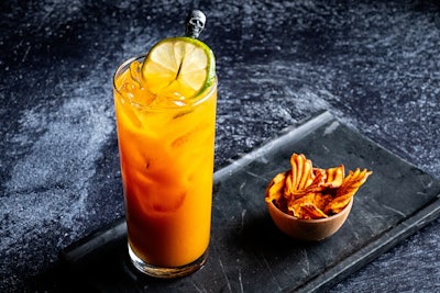 The Smoky Sweet Potato Margarita is made with Del Maguey Vida mezcal, sweet potato puree, lemon, and agave from the “spirit” world and is paired with sweet potato chips from the “physical” world.