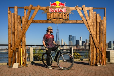 Professional bike rider Nicholi Rogatkin poses in front of the Red Bull Rampage gates, which traveled around the NYC area ahead of the competition in Utah. Here, the gates landed at Liberty State Park in Jersey City, N.J.