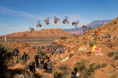 Bienvenido Aguado Alba front flips at the Red Bull Rampage. Riders of the competition are scored on difficulty level of the line, tricks and style, fluid and control, and altitude over the cliffs.