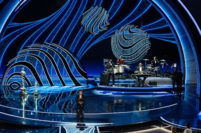 Another impactful Oscars stage came from Emmy-winning production designer David Korins in 2022. The set included a combined 12,940 Swarovski crystals and 252 strands, weighing a total of 1,350 pounds. See more: Oscars 2022 Review: Event Producers Give the 94th Ceremony a B