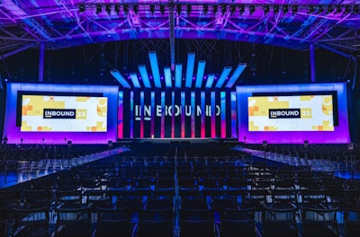 Pulled back, the stage made even more of an impact with large screens on either side, plus colorful panels extending off the top of the stage's backdrop. Lighting created an impactful ombré effect. See more: 6 Smart Event Strategies From HubSpot INBOUND 2023