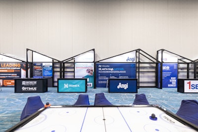 These custom-built sponsor booths were meant to evoke peaks and valleys as a nod to the 'journey to the top' theme. 'I love the variation in the peaks, because I think it created a lot of visual interest when you saw them all together,' Cappuccitti said. 'It was really striking.'