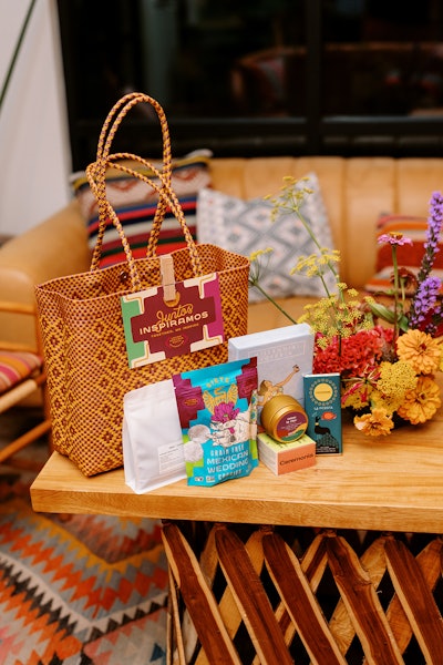 The evening’s goodie bags were filled with Latinx-backed products, including CocoAndré Chocolatier chocolate, Desnudo Coffee, Bonita Fierce candles, Ceremonia hair care, and Millennial Lotería Cards by Mike Alfaro. Georgina Herrera designed the bags hand-woven by an Indigenous community in Mexico and made from recycled plastic.