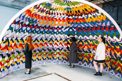 For the 2023 Future of Everything Festival, The Wall Street Journal's event team opted for sustainable fabrics like 100% merino wool. Wool curtains, which were used to partition event spaces, were later repurposed by production partner Studio Left for a bespoke art project (pictured) at the LA Design Festival.