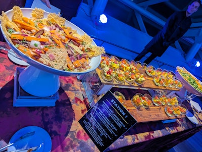 As part of the more relaxed atmosphere, the bash had a strolling buffet instead of a seated dinner. Stations from Food for Thought offered vegetarian salads (pictured), salmon tartines on grilled local bread, and macaroni and cheese mixed up in a giant wheel of Parmesan. MDM Entertainment handled event production.