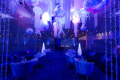 The lounges featured iridescent bubble orbs, eye-catching crystals that caught light like a silver jack fish, and custom wave drapes to mimic the sea and illuminate an ever-changing jellyfish. “The environment made guests feel transported to an alternate underwater dimension,” said Taylor.